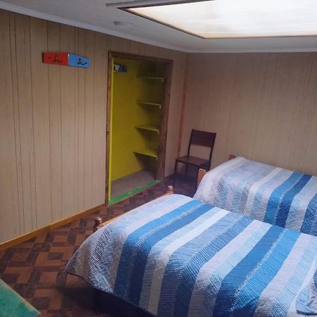 Hostal Y Residencial El Mundial Puerto Natales Bagian luar foto