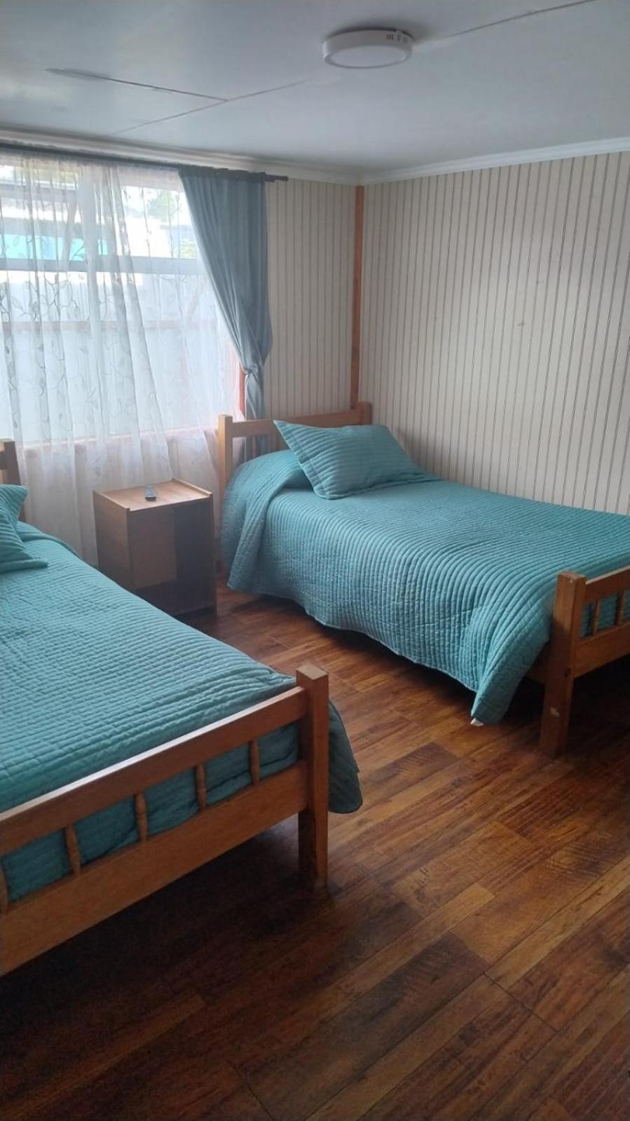 Hostal Y Residencial El Mundial Puerto Natales Bagian luar foto