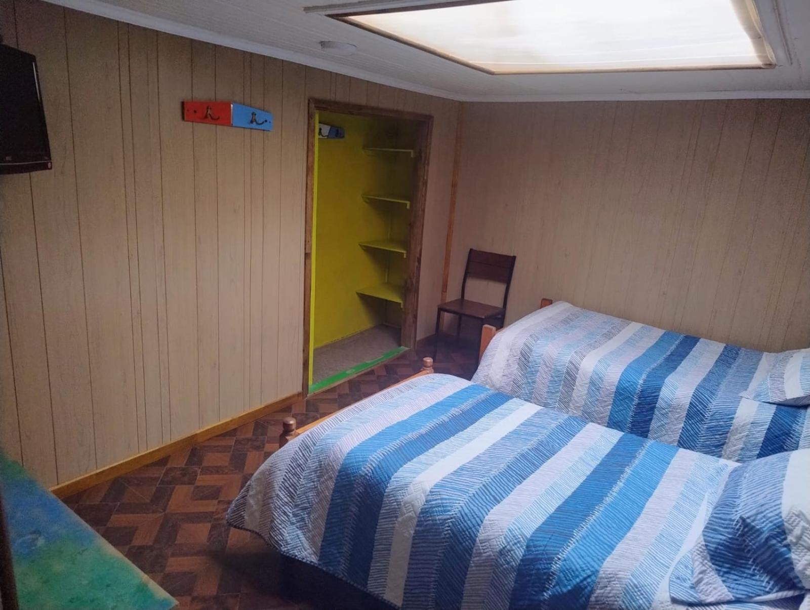 Hostal Y Residencial El Mundial Puerto Natales Bagian luar foto